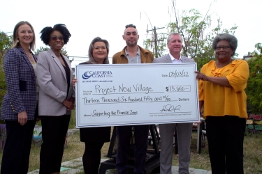 Councilmembers with large check 
