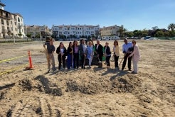 Group of people ground breaking 