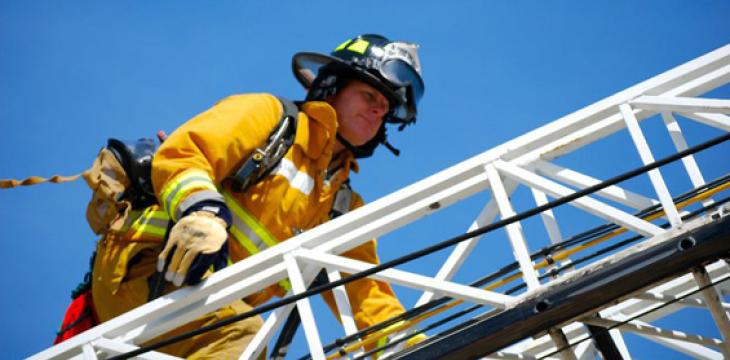 Photo of Fireman on Truck Ladder