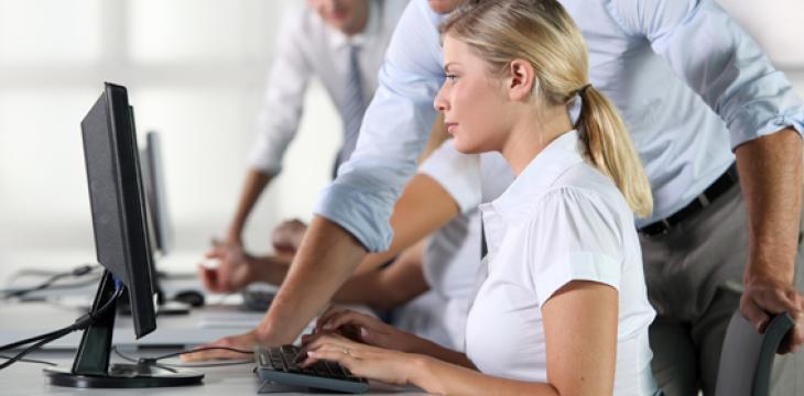 Photo of Girl Working on a Computer