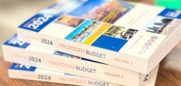 stack of FY24 Proposed Budget books