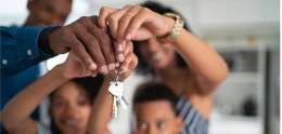 Family Holding Home Keys