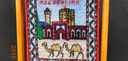 Small hand-made multi-color carpet from Azerbaijan