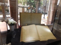 Alonzo E. Horton's name is reflected in one of the earlier Mt. Hope Cemetery Lot Books dated March of 1873 