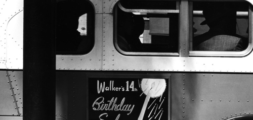 Walker Scott 14th Birthday Sale Advertisement on a San Diego Bus