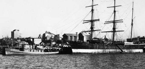 Star of India Docked at Harbor Drive, Globe Mills in Background