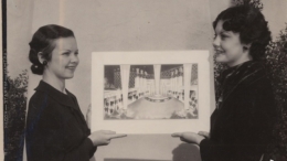 Women holding a photo of a building / dome structure at the California Pacific International Exposition, held in May - November 1935 and February - September 1936