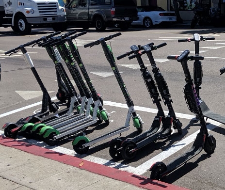 Parked motorized scooters