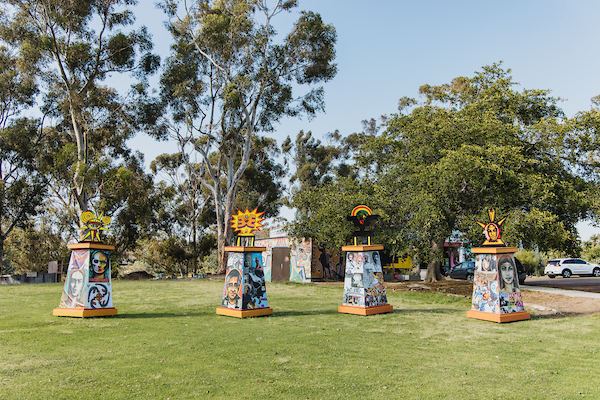 Toltec Totems displayed at a park
