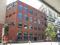 A picture of the Western Metal Supply Company Building from inside Petco Park.